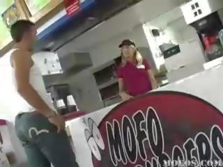 Charming fast food worker gets down on her knees to blow two adolescents