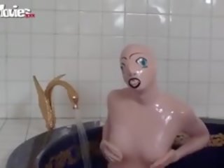 Tanja Takes A Bath In Her Latex x rated video Doll Costume