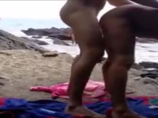 Cheating on the nude beach.