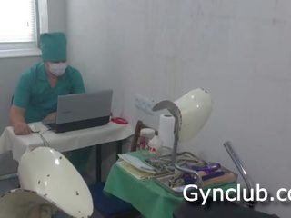Examination on the gynecological chair of a dildo and a vibrator (04)