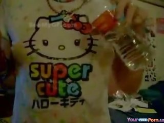 Flirty Japanese lassie With Wet Hello Kitty T-Shirt